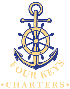 Logo of four keys charters featuring a combined design of an anchor and a ship's wheel in blue and gold colors.